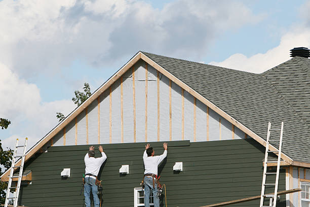 Professional Siding Contractor technician working in Carteret, NJ